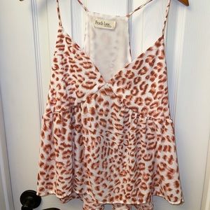 Orange leopard print ruffle top